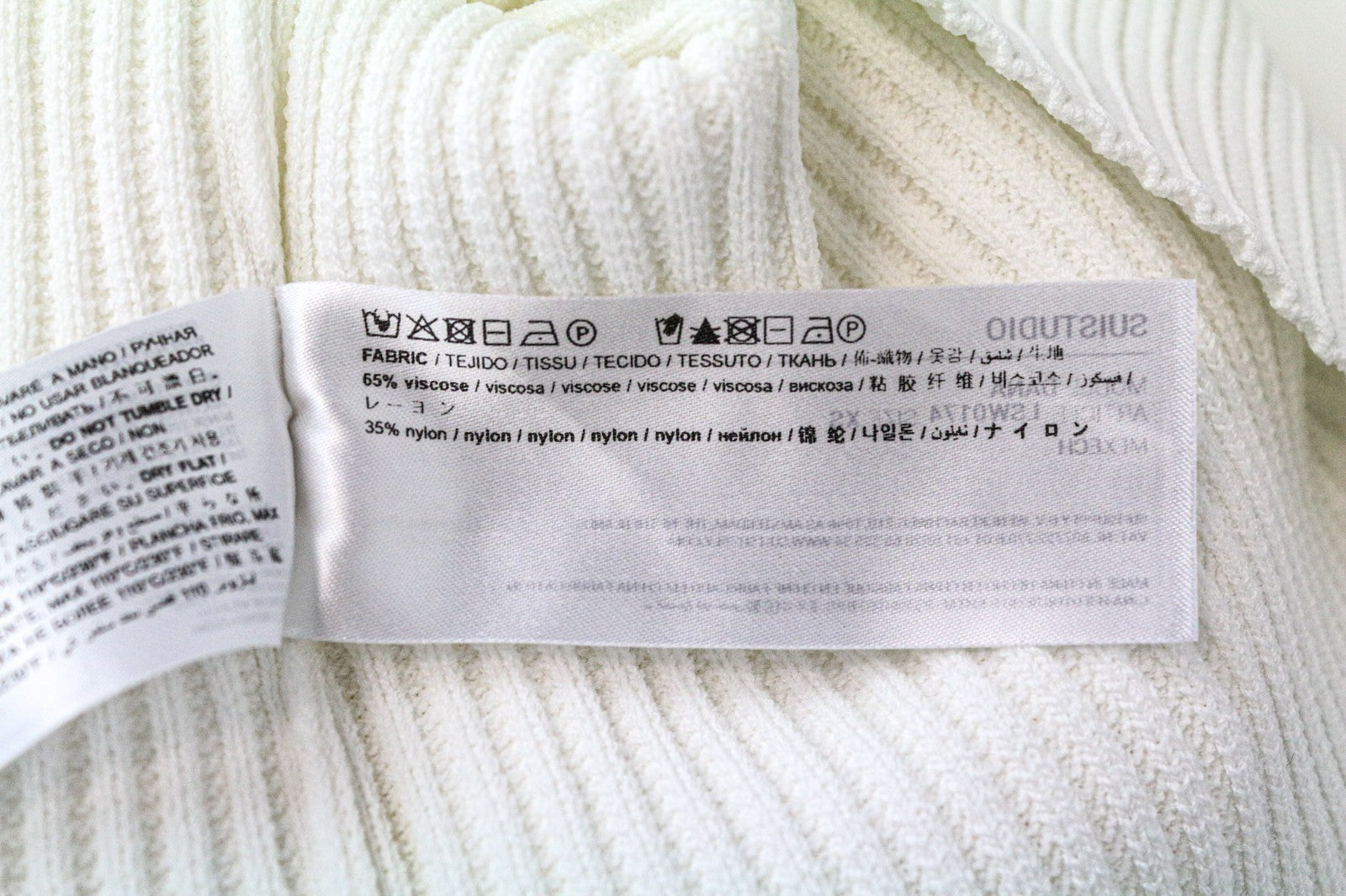 SUISTUDIO Dana moteriški marškinėliai XS dydžio balkšvai balti, ploni, briaunoti, megzti marškinėliai be rankovių 