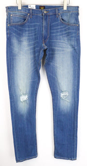 LEE Luke vyriški džinsai W36/L34 apdriskę, ploni, siaurėjantys, medvilniniai, tamprūs, mėlyni 