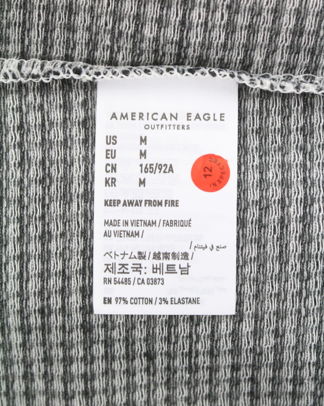 AMERICAN EAGLE OUTFITTERS Women T-Shirt M Black Plaid Pattern Crew Short Sleeve