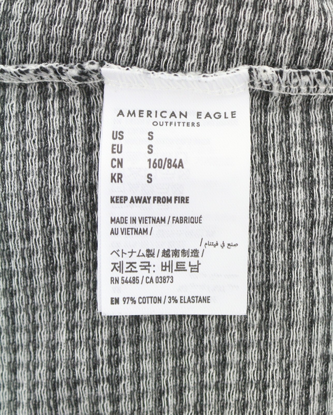 AMERICAN EAGLE OUTFITTERS Women T-Shirt S Black Plaid Pattern Crew Short Sleeve