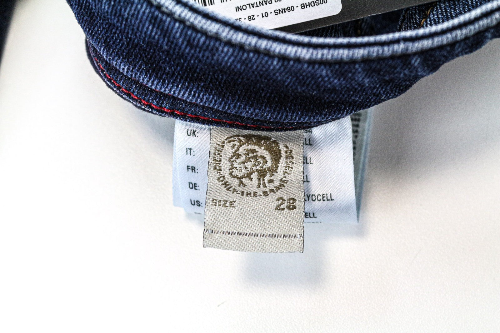 DIESEL Buster 084NS vyriški džinsai W28/L32 mėlyni, ploni, siaurėjantys, tamprūs, įprasti. 