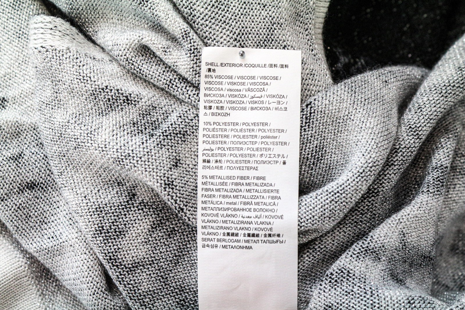 DESIGUAL Baku moteriškas džemperis pilkas juodas raštuotas blizgantis V formos iškirptės viršus XS 