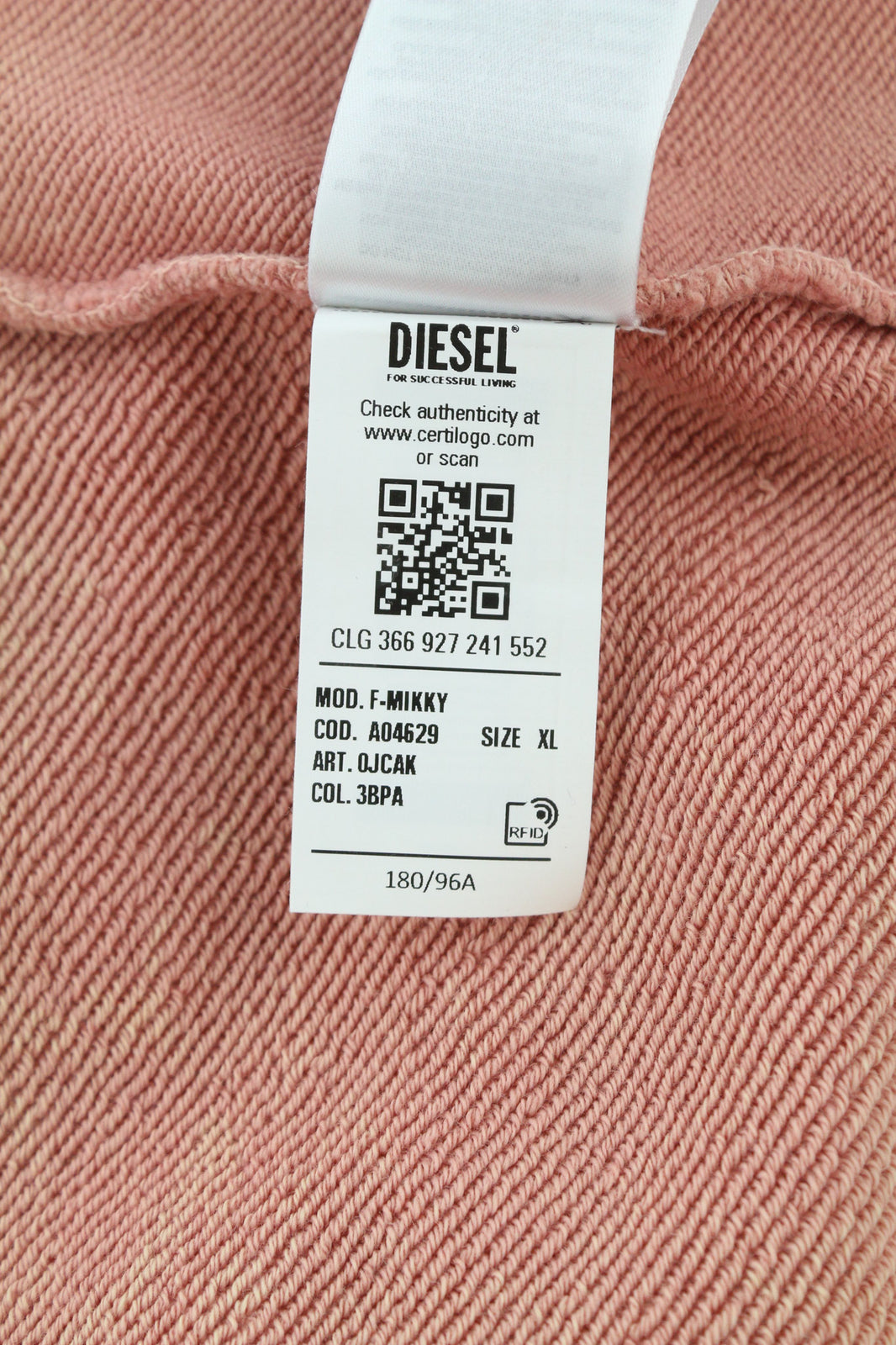 DIESEL F-Mikky Felpa moteriškas džemperis su gobtuvu XL dydžio, persikų spalvos, asimetrinis, su kišene. Rekomenduojama kaina – 195 €. 
