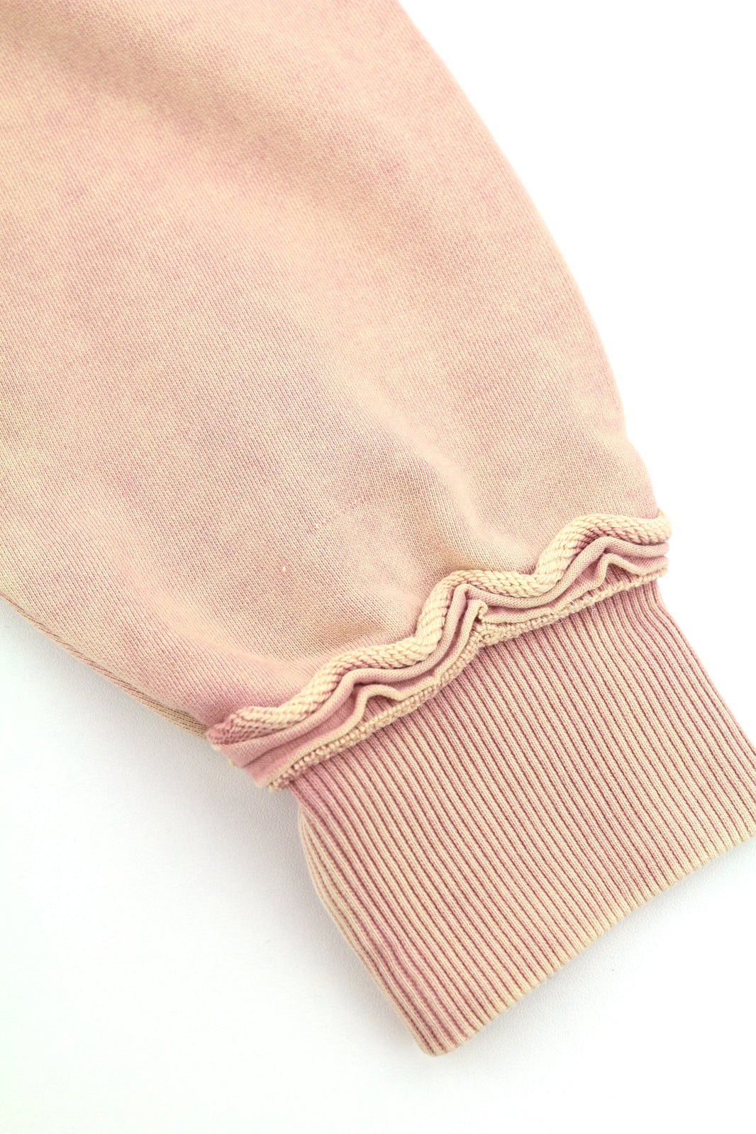 DIESEL F-Mikky Felpa moteriškas džemperis su gobtuvu S su persikų spalvos asimetriška kišene ir gobtuvu. Rekomenduojama kaina – 195 €. 