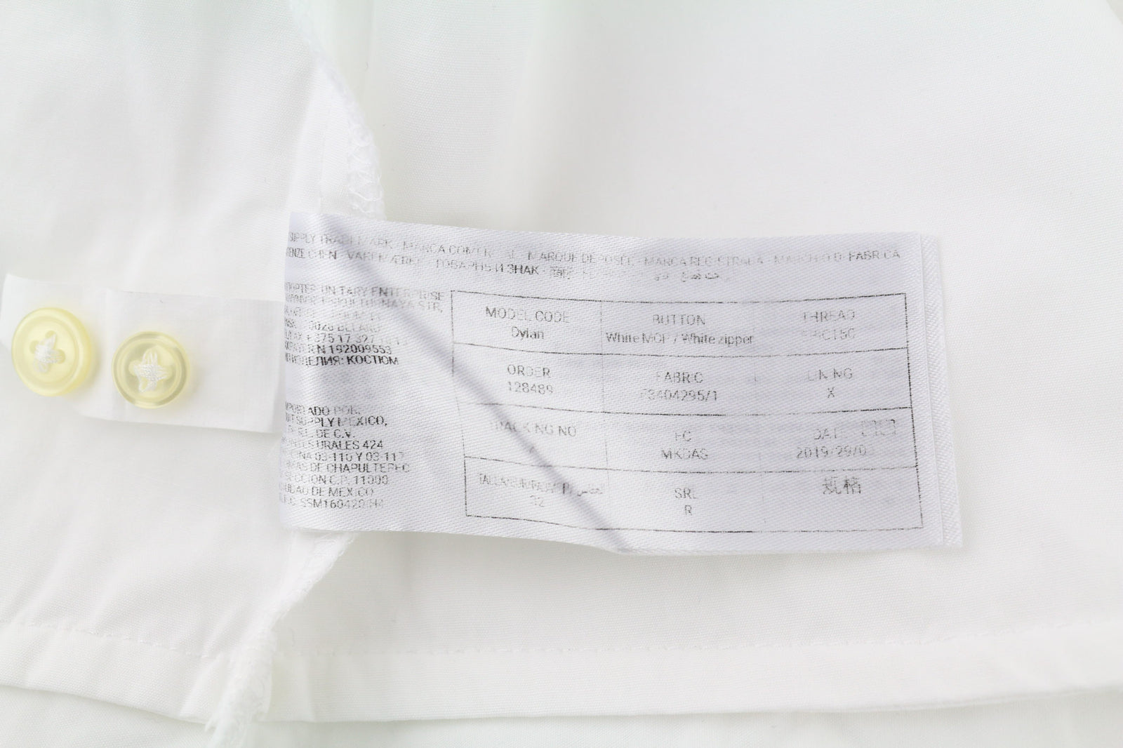 SUISTUDIO Dylan moteriška suknelė, UK6, balta medvilninė ilgomis rankovėmis, apvali kaklo iškirpte, trumpi šortai su logotipu. 