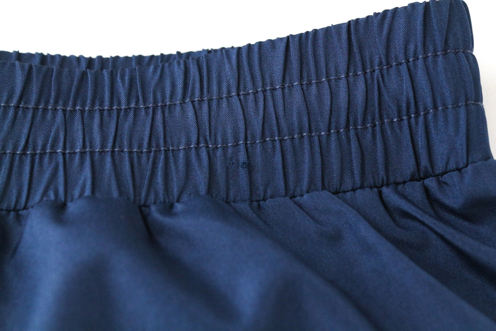 SWEATY BETTY W29 mėlyni moteriški šortai su užtrauktuku ir kišenėmis, užtraukiami sportiniai drabužiai 