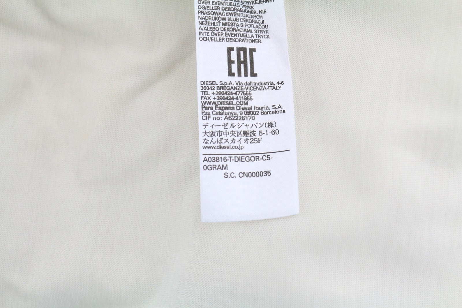 DIESEL T-Diegor-C5 vyriški marškinėliai XL dydžio, dramblio kaulo spalvos, trumpomis rankovėmis, apvalia kaklo iškirpte, medvilnės mišinio logotipu 