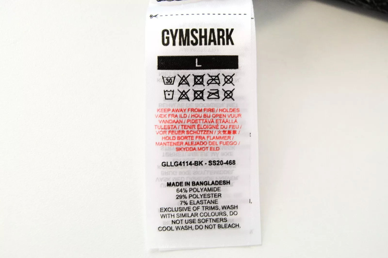 GYMSHARK moteriškos tamprės L dydžio, vidutinio pilkumo, melanžo, tamprios sportinės aprangos detalės su logotipu 