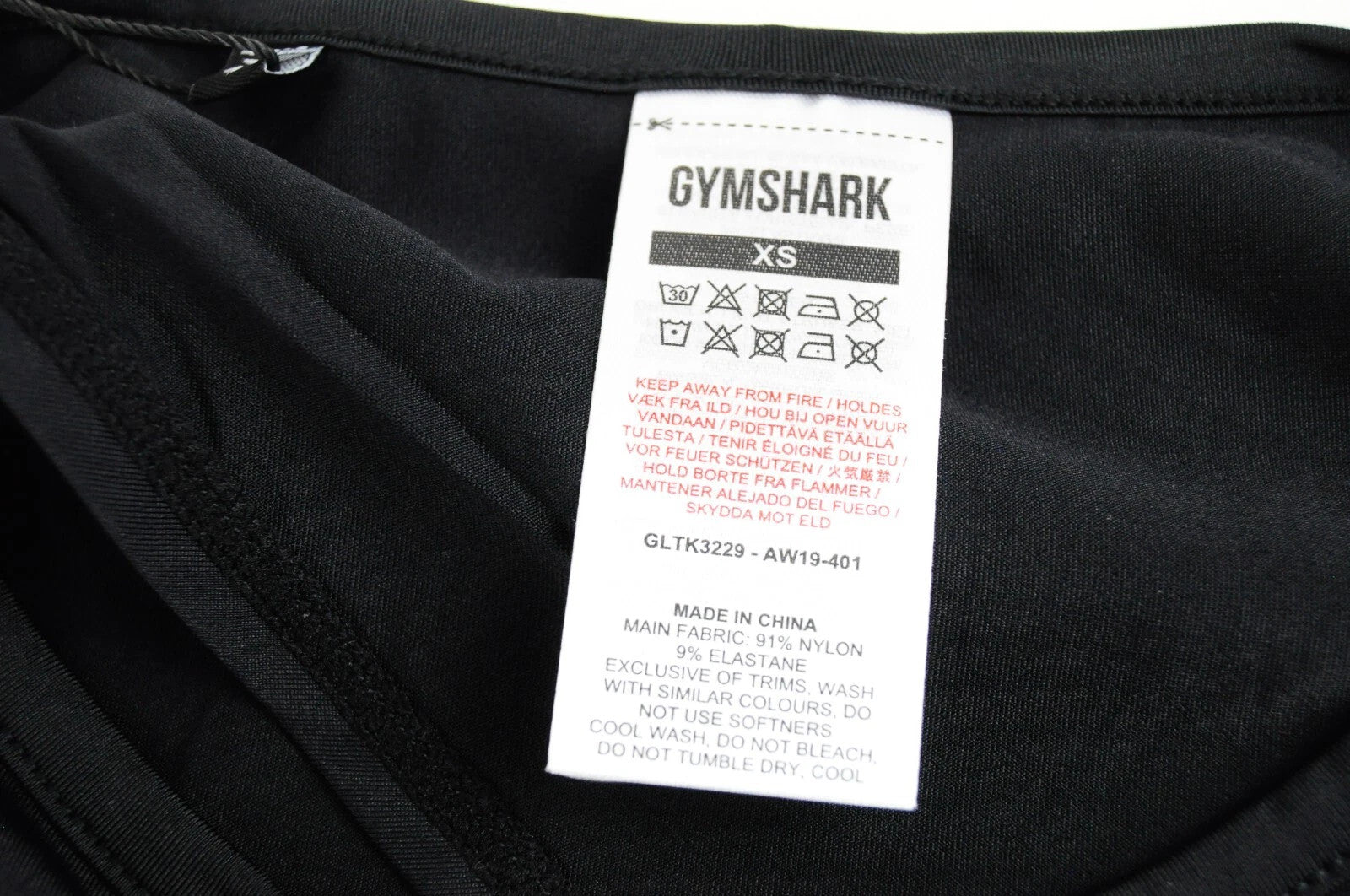 GYMSHARK moteriški marškinėliai XS dydžio, lazeriu pjaustyti, juodi, kvėpuojantys, lengvi.