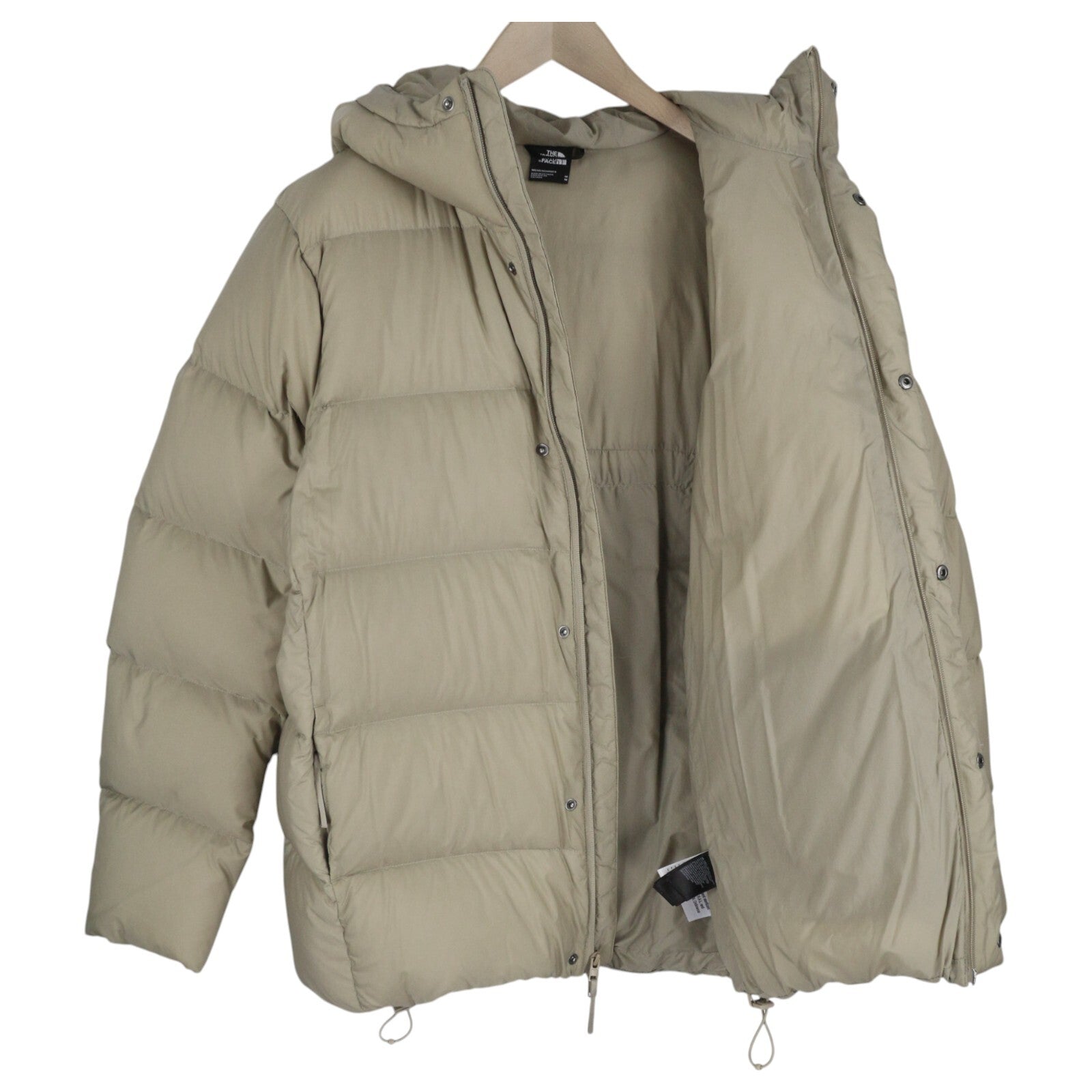 „THE NORTH FACE“ vyriška striukė M, smėlio spalvos, 700 pūkinė, izoliuota, su gobtuvu ir dygsniuotu logotipu. 