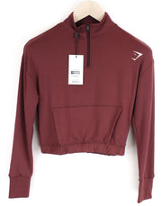 GYM SHARK moteriškas Pippa džemperis XS dydžio vyšnių rudos spalvos ilgomis rankovėmis, tamprus sportinis trumpas džemperis 