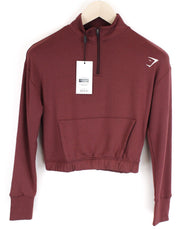 GYM SHARK moteriškas Pippa džemperis S dydžio vyšnių rudos spalvos ilgomis rankovėmis, tamprus sportinis trumpas 
