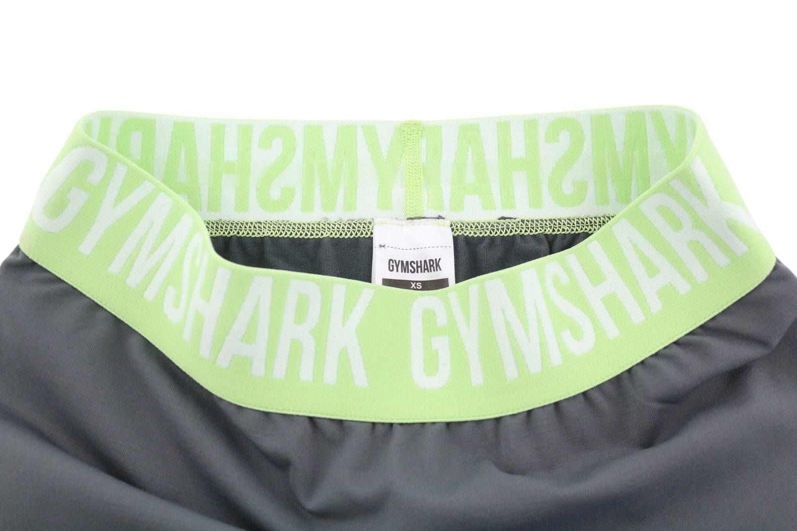 GYMSHARK GLLG4276 moteriškos tamprės XS dydžio, besiūlės, trumpos, žemo juosmens, tamprios, pilkos spalvos 