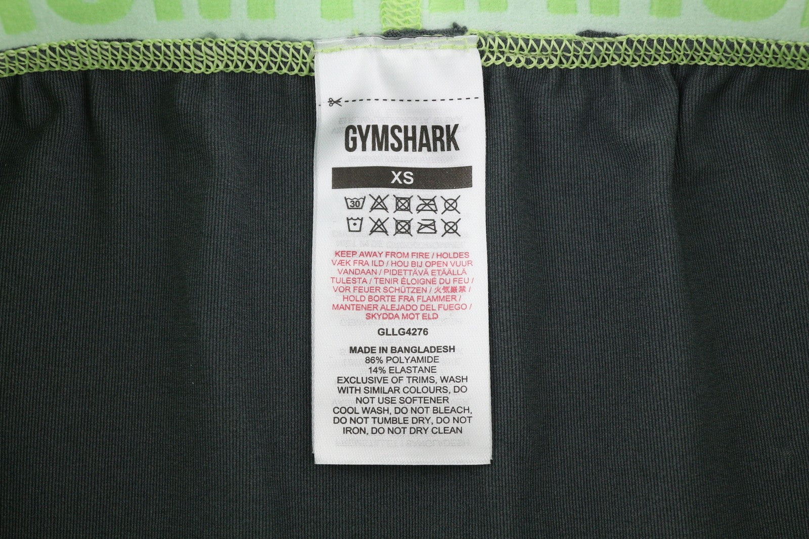 GYMSHARK GLLG4276 moteriškos tamprės XS dydžio, besiūlės, trumpos, žemo juosmens, tamprios, pilkos spalvos 