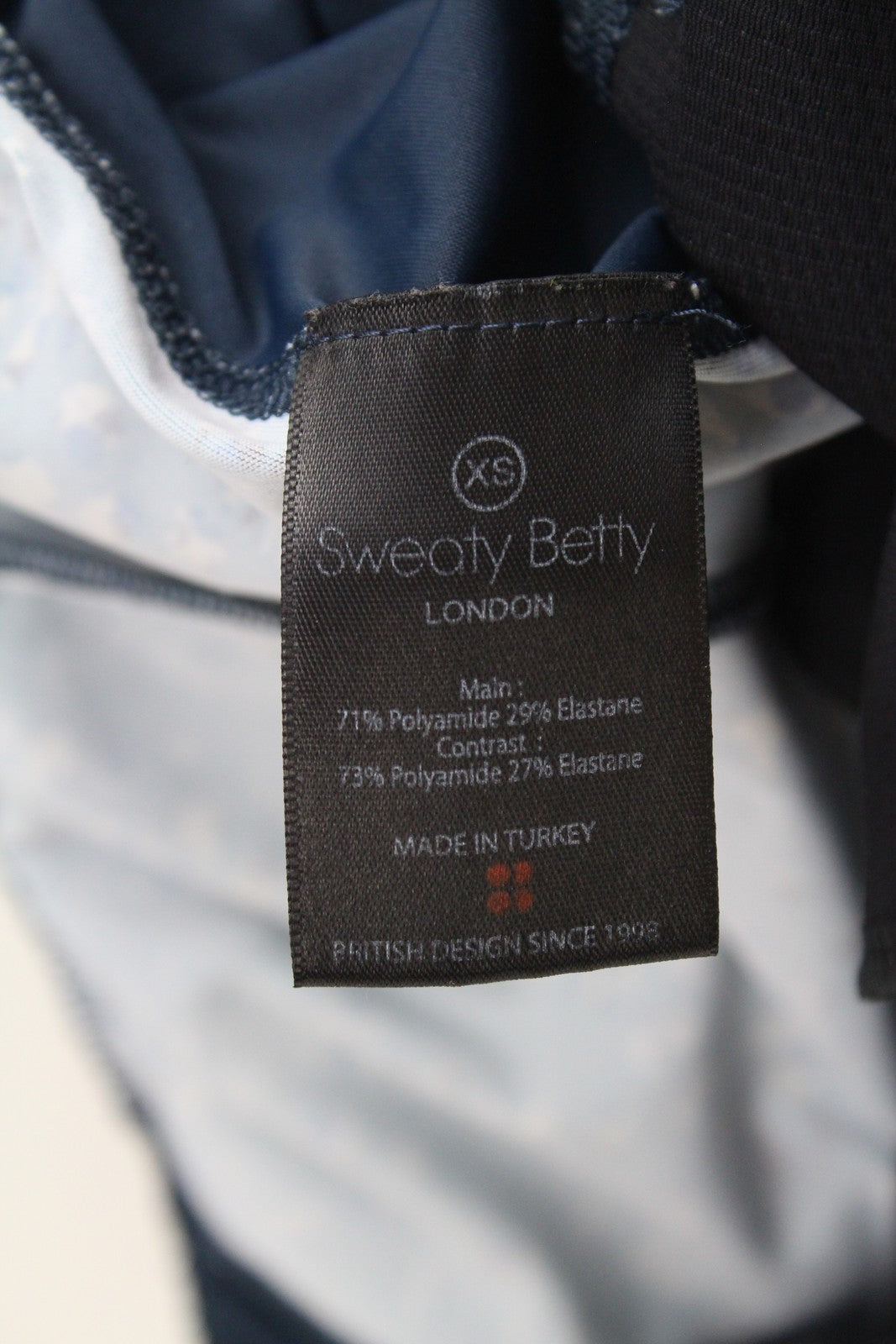 SWEATY BETTY moteriškos XS dydžio mėlynos raštuotos tamprios sportinės kelnės su užtraukiamais gobtuvais 