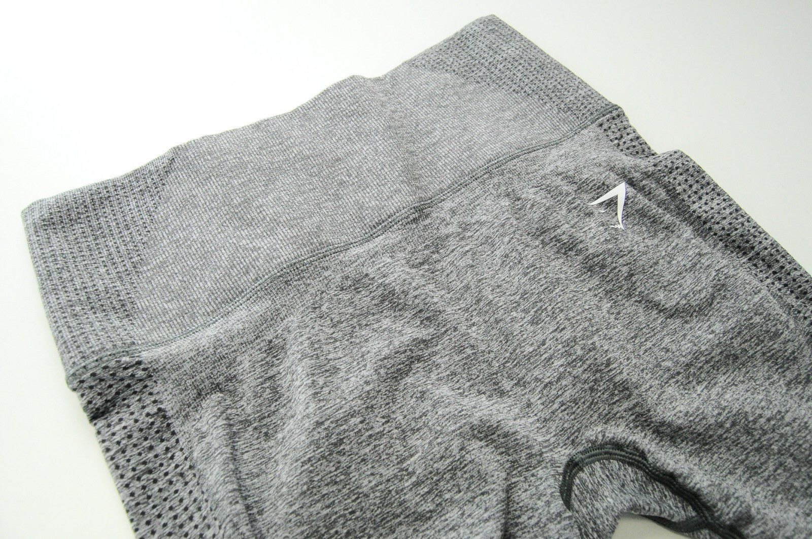 GYMSHARK moteriškos pilkos M dydžio sportinės tamprės su logotipu ir užtrauktuku bei kišenėmis 