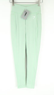 GYMSHARK moteriškos tamprės XS dydžio pistacijų žalios svajingos, tamprios kelnės 