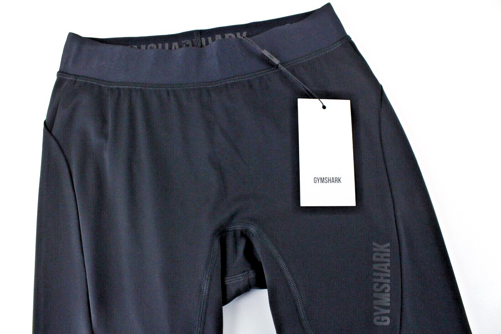 GYMSHARK moteriškos tamprės su juodu juosmeniu, tampriu sportinės aprangos logotipu, Focus logotipu. 