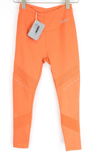 GYMSHARK Pro Perform moteriškos tamprės su oranžine logotipu ir sportine apranga 