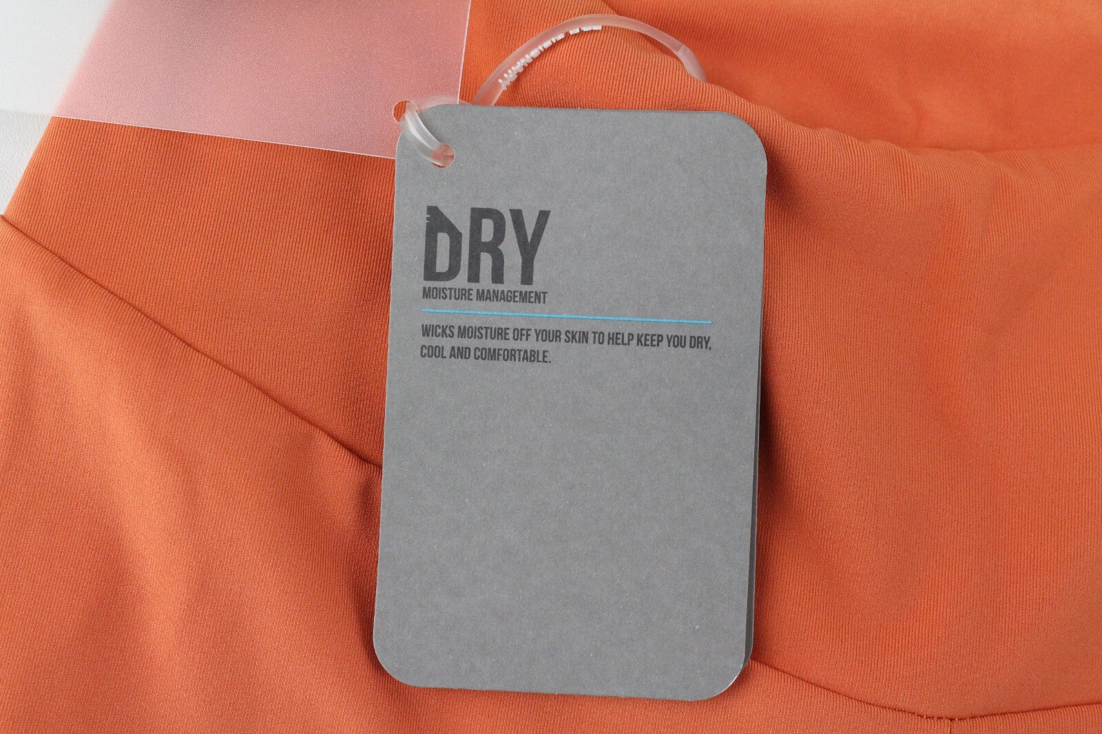 GYMSHARK Pro Perform moteriškos tamprės su oranžine logotipu ir sportine apranga 