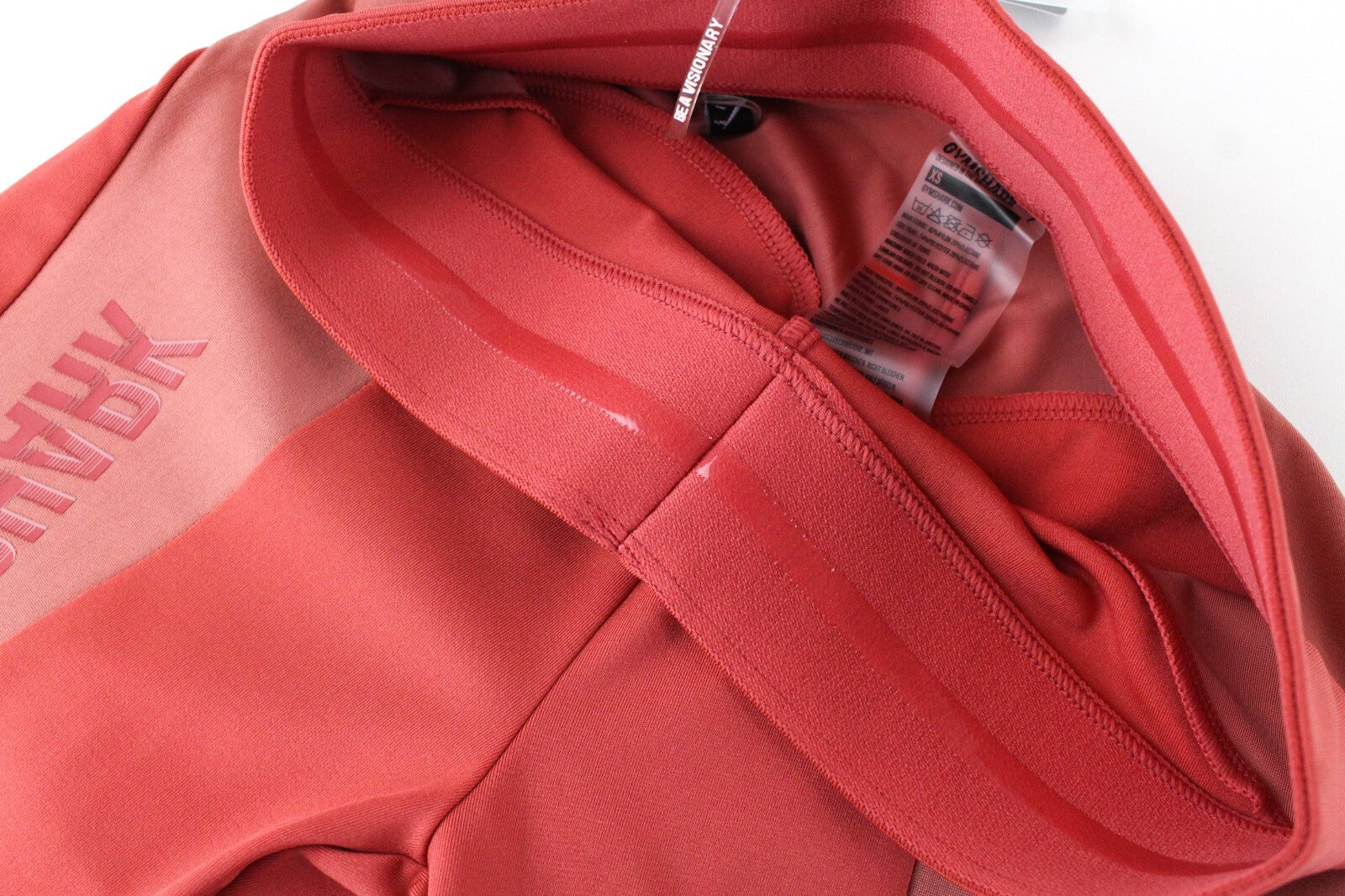 GYMSHARK Turbo moteriškos tamprės XS dydžio oranžinės spalvos su tampriais logotipais ir sportine apranga 