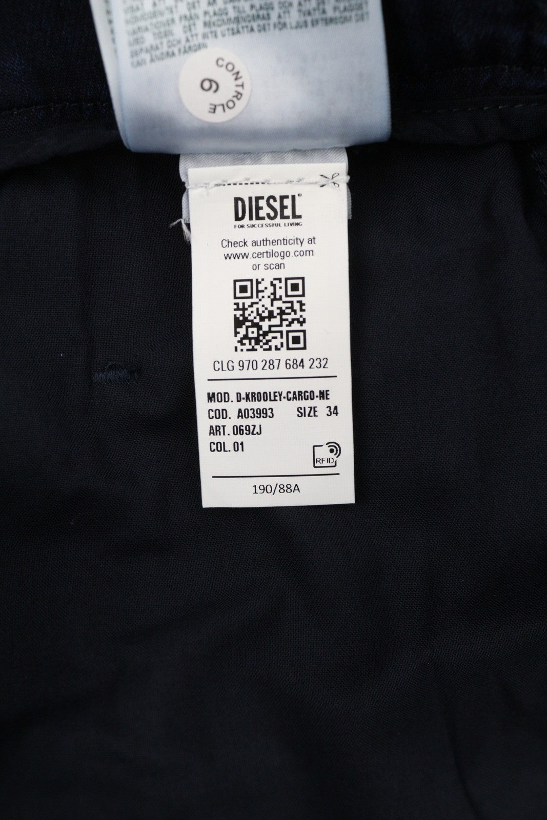 DIESEL D-Krooley-Cargo-Ne 069ZJ vyriški džinsai W34 su juosmeniu, siaurėjančiomis klešnėmis, rekomenduojama kaina – 295 €, mėlyni 