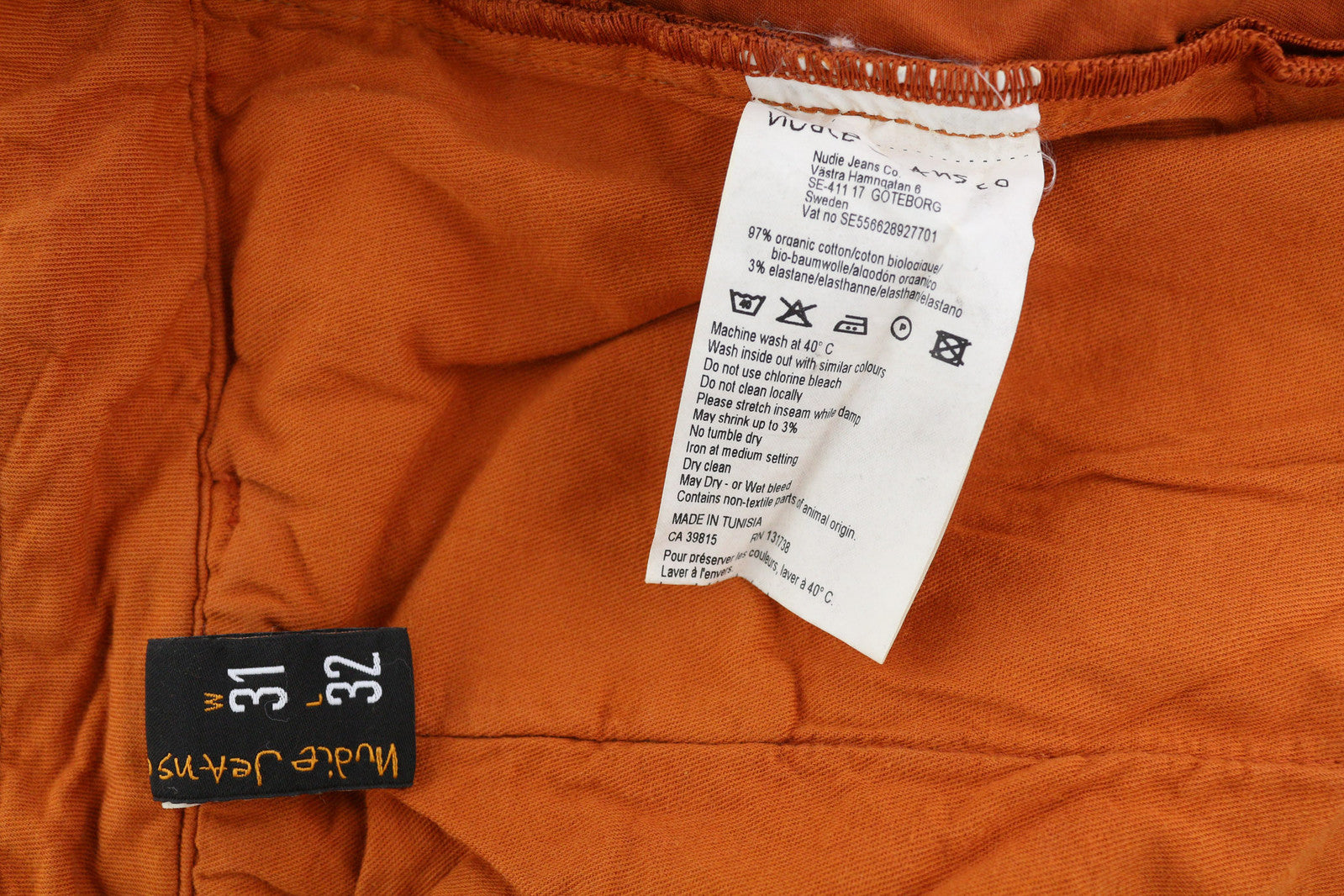 NUDIE JEANS Khaki spalvos plonos vyriškos kelnės W31/L32 ekologiškos, šiltos oranžinės spalvos, laisvalaikio stiliaus chino džinsai su užtrauktuku 