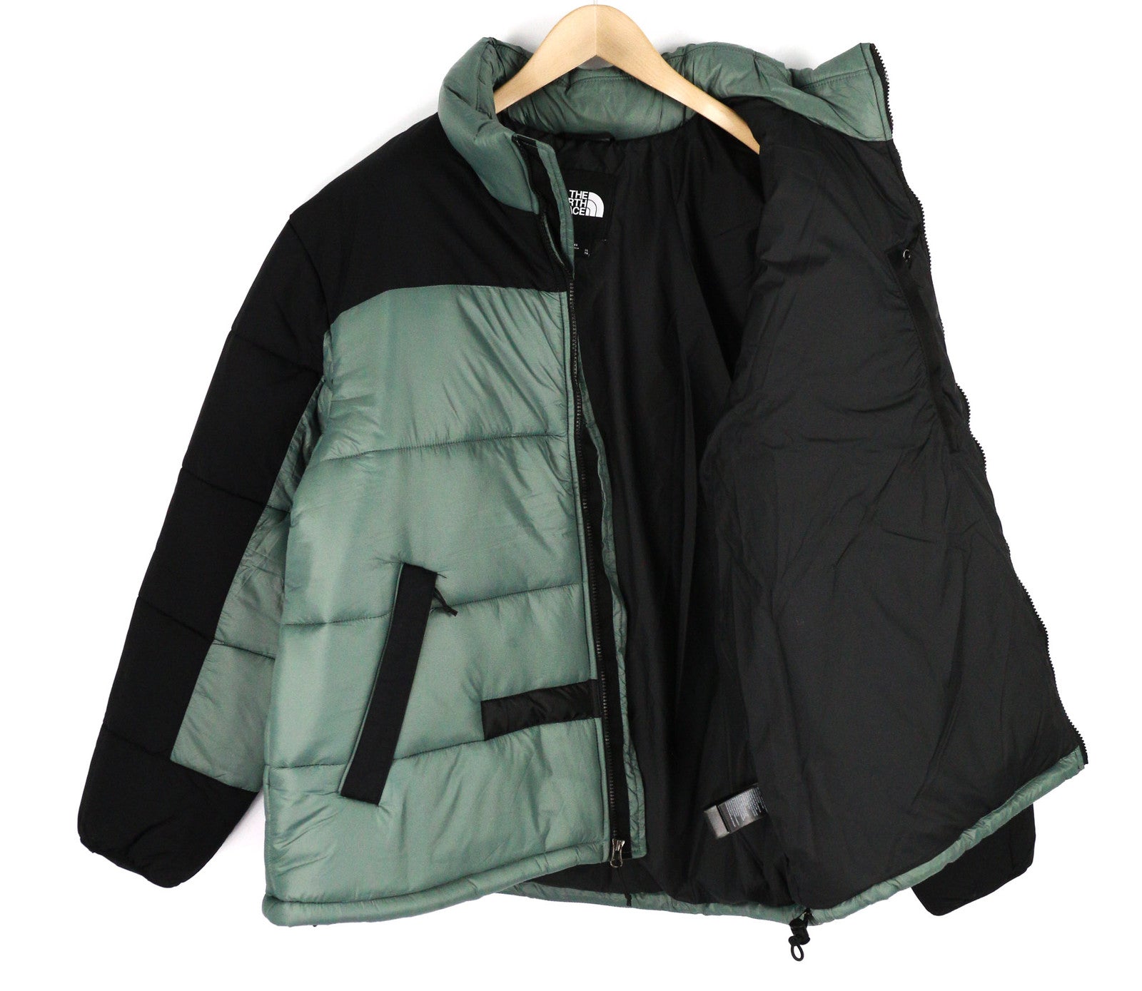 „The North Face Himalayan Parka“ vyriška striukė, tamsi, su pilnu užtrauktuku, dygsniuota. 