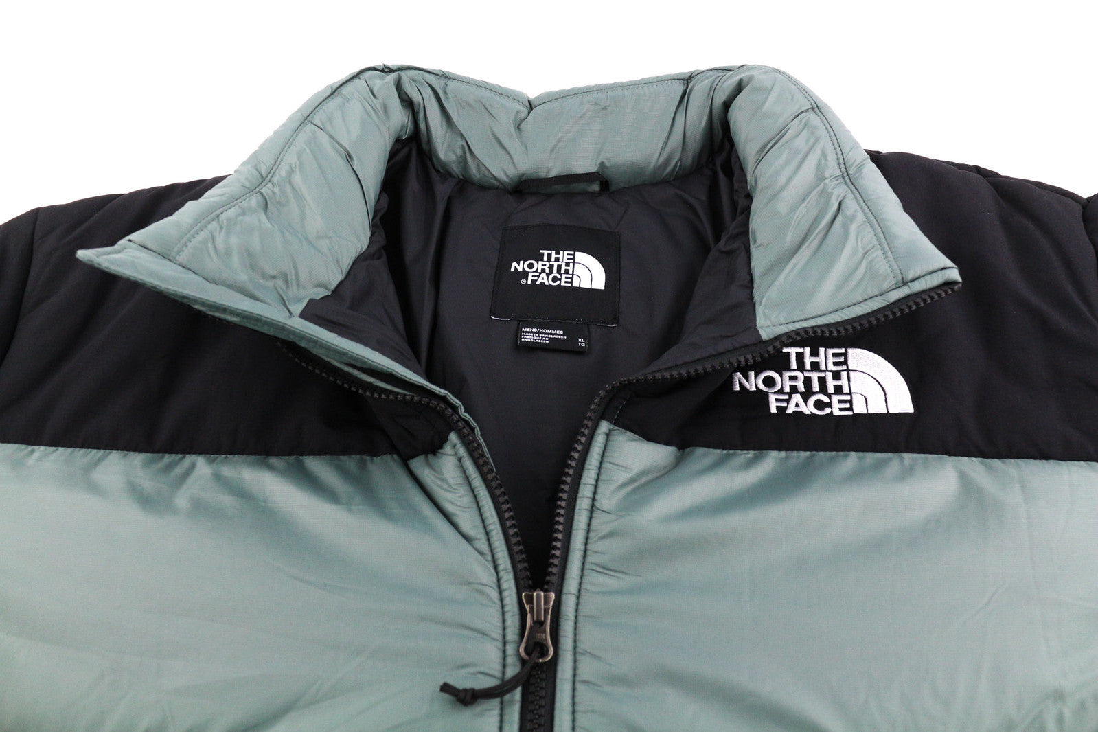 „The North Face Himalayan Parka“ vyriška striukė, tamsi, su pilnu užtrauktuku, dygsniuota. 