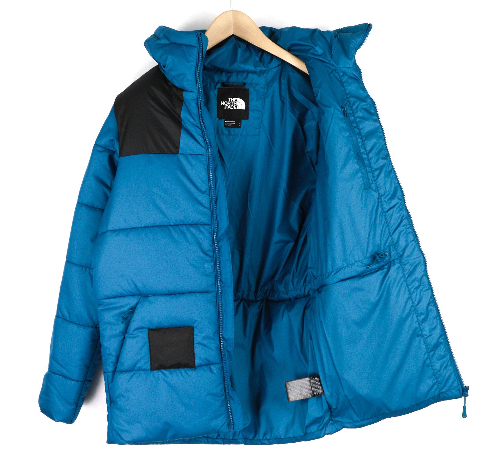 „THE NORTH FACE“ vyriška striukė XS, mėlyna, su pilnu užtrauktuku, izoliacija, gobtuvu, pamušalu ir dygsniuotu logotipu. 