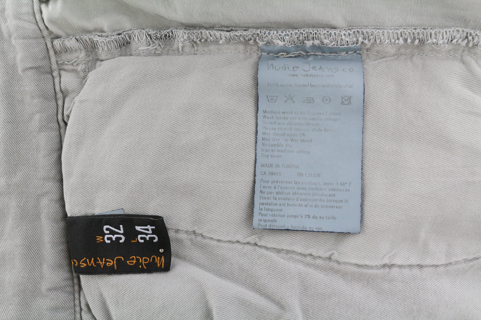 NUDIE JEANS Khaki spalvos įprastos vyriškos kelnės W32/L34 Organic Moon Dust Chino Button 