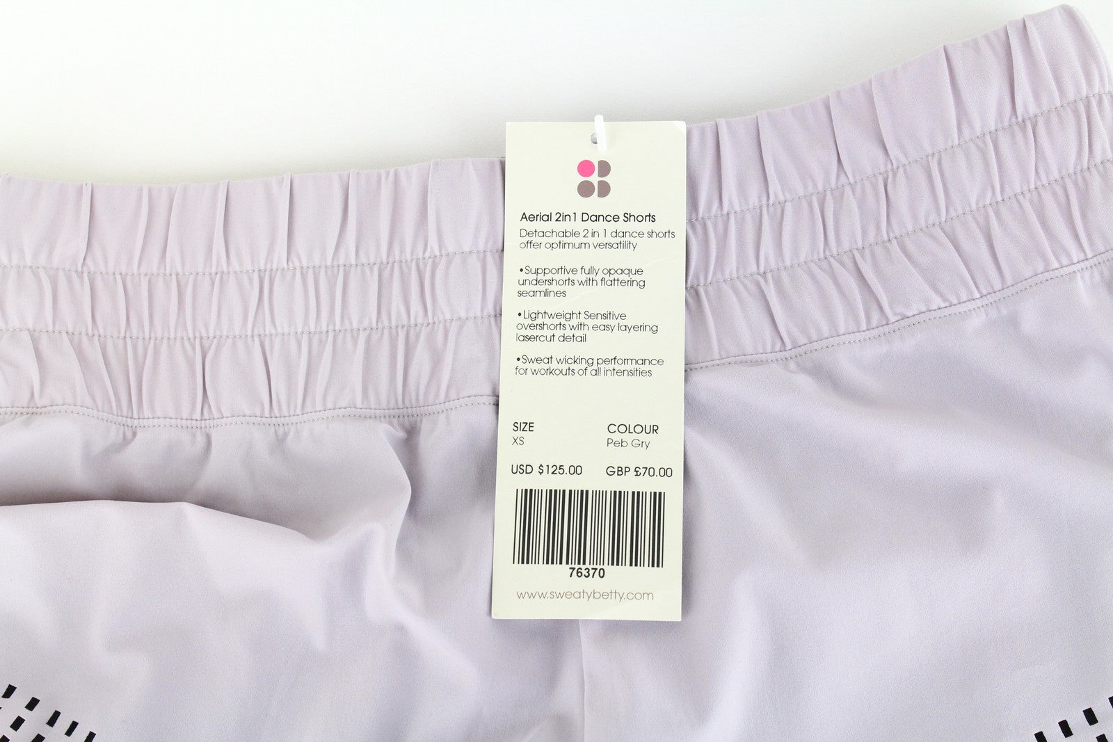 SWEATY BETTY Aerial 2in1 moteriški šortai XS, violetiniai, juodi, tamprūs, daugiasluoksniai, sportiniai 