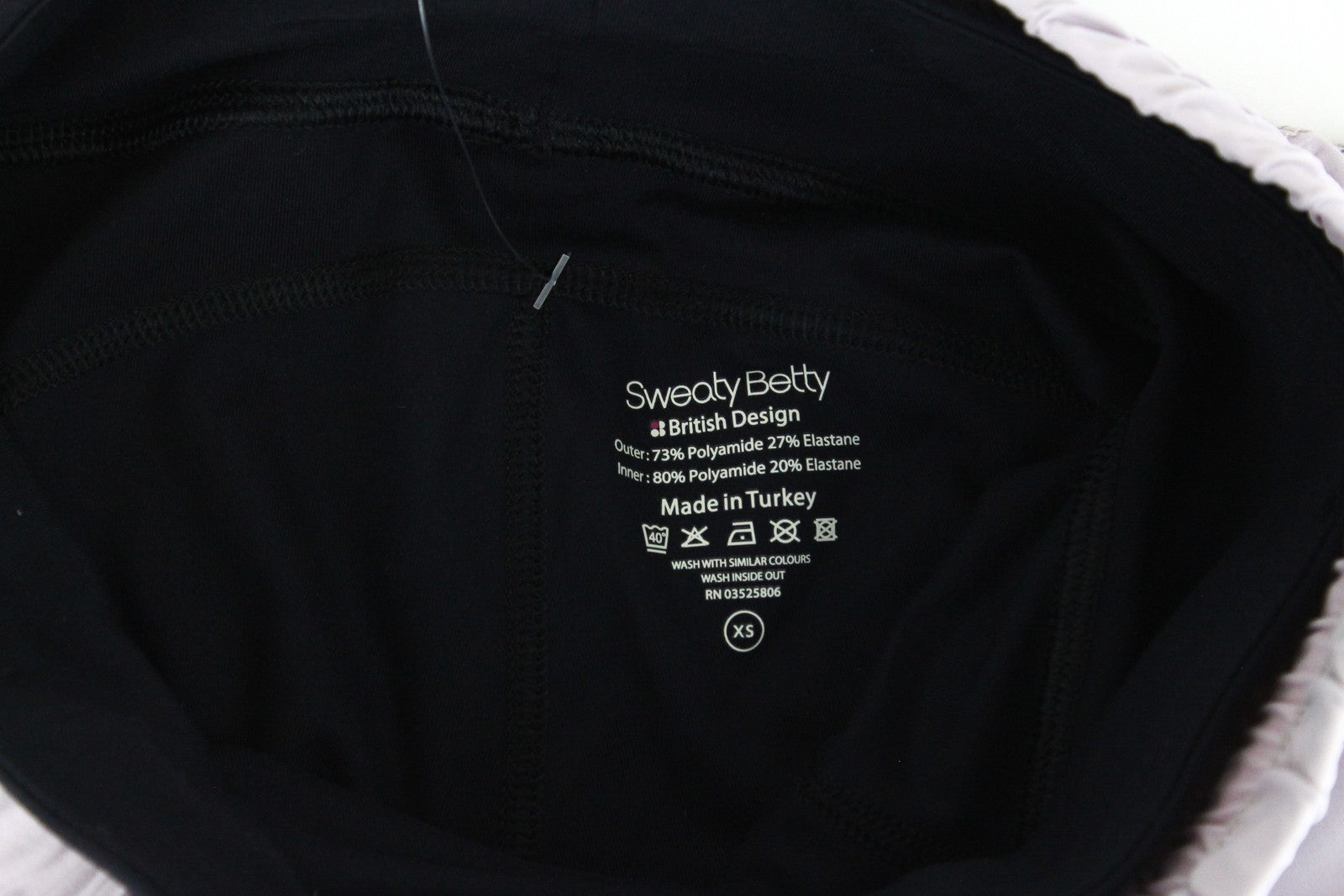 SWEATY BETTY Aerial 2in1 moteriški šortai XS, violetiniai, juodi, tamprūs, daugiasluoksniai, sportiniai 