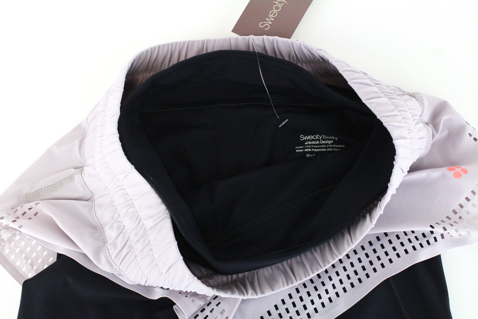 SWEATY BETTY Aerial 2in1 moteriški šortai XS, violetiniai, juodi, tamprūs, daugiasluoksniai, sportiniai 