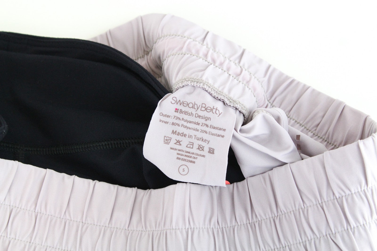 SWEATY BETTY Aerial 2in1 moteriškos bėgimo šortai S dydis, violetiniai, juodi, aktyvūs, daugiasluoksniai 