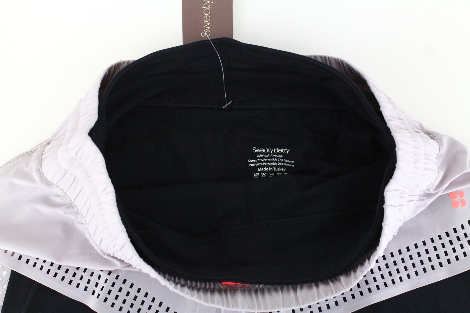 SWEATY BETTY Aerial 2in1 moteriški šortai M violetiniai juodi sportinės aprangos tamprūs logotipai 