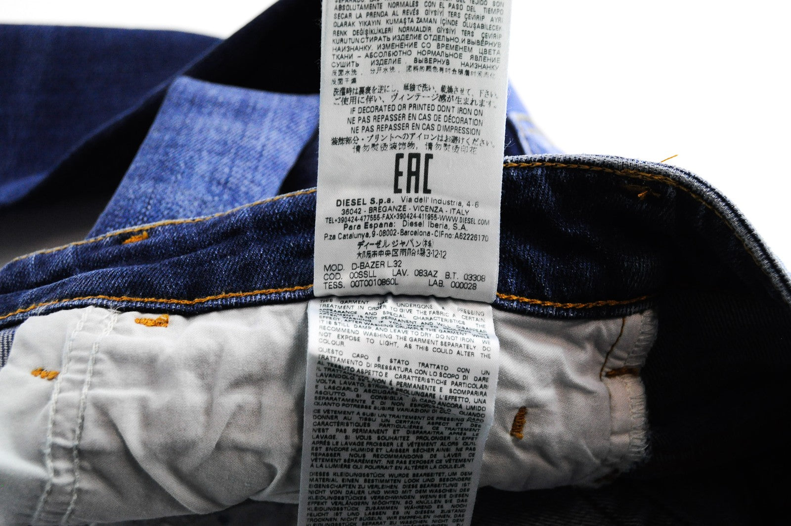 Vyriški DIESEL džinsai D-Bazer 083AZ W27/L32 mėlyni, siaurėjantys, plėšyti, tamprūs. 
