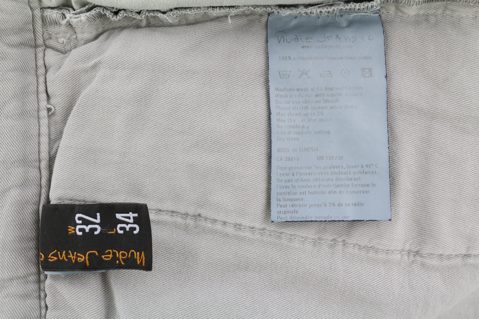 NUDIE JEANS chaki spalvos įprastos vyriškos kelnės W32/L34 organinės mėnulio dulkės chino spalvos su sagomis 