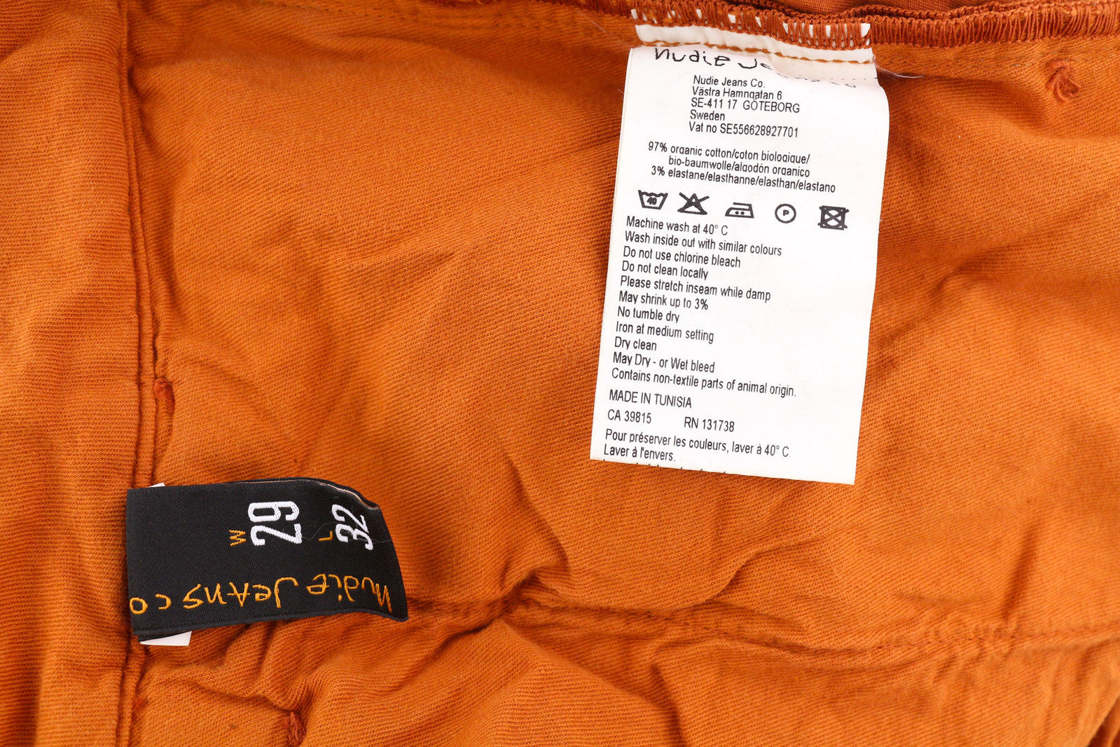 NUDIE JEANS Khaki spalvos plonos vyriškos kelnės W29/L32 ekologiškos, šiltos oranžinės spalvos, laisvalaikio stiliaus chino džinsai su užtrauktuku 