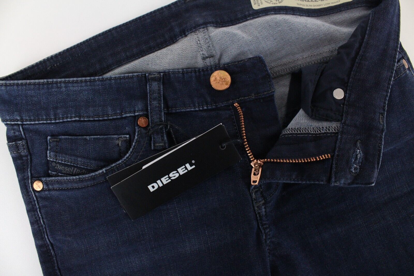 DIESEL Skinzee-Low-S 0681G moteriški itin ploni tamprūs džinsai W26/L30 