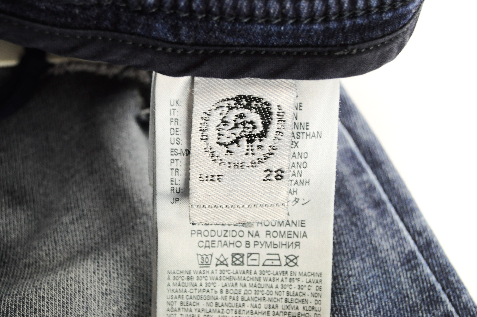 DIESEL Krooley-NE 084TZ W28 vyriški mėlyni siaurėjantys plėšyti tamprūs džinsai 