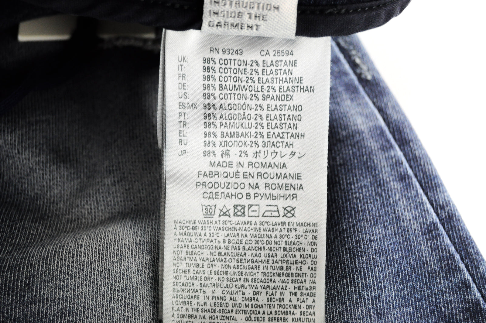 DIESEL Krooley-NE 084TZ W28 vyriški mėlyni siaurėjantys plėšyti tamprūs džinsai 