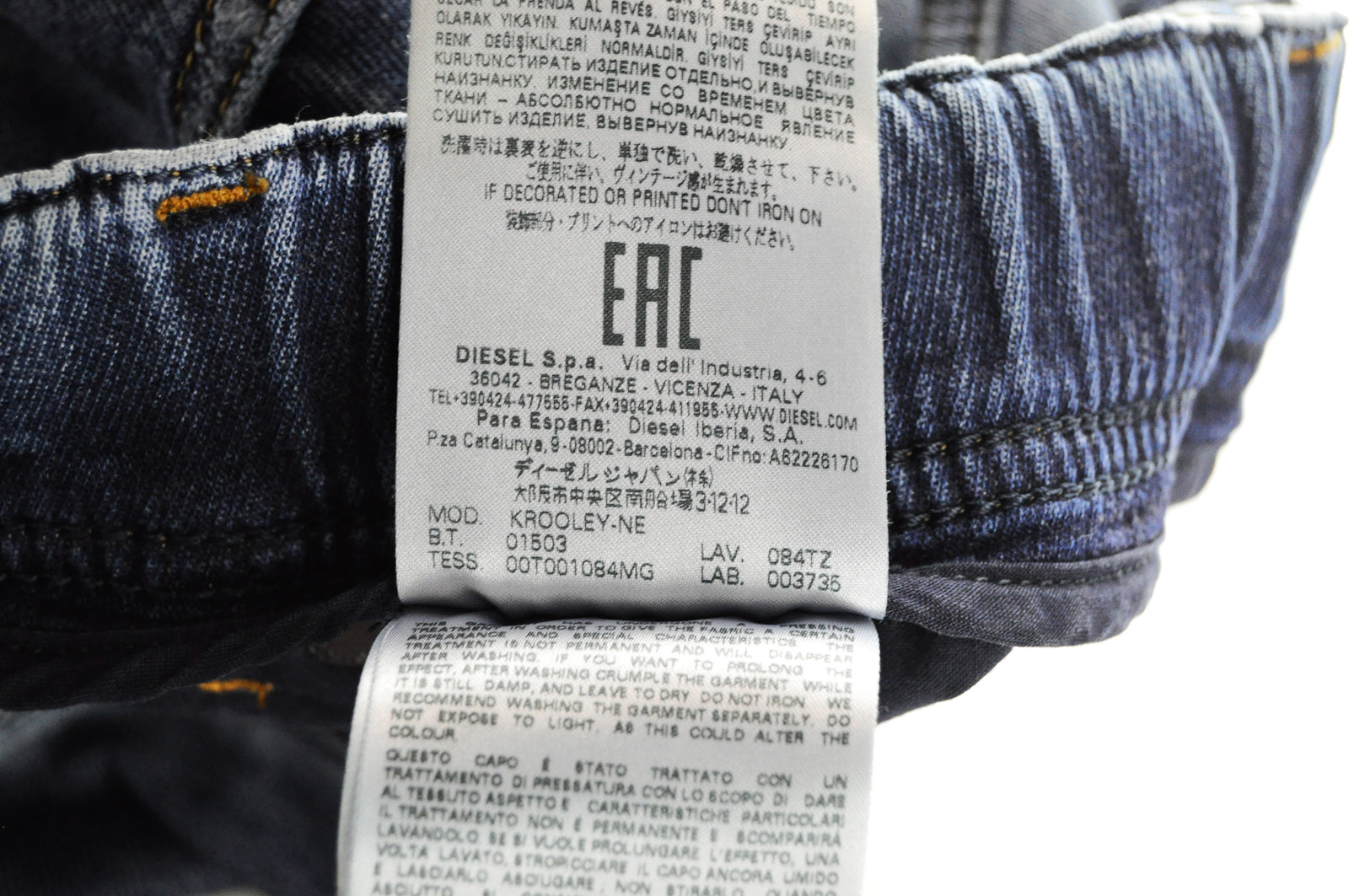 DIESEL Krooley-NE 084TZ W28 vyriški mėlyni siaurėjantys plėšyti tamprūs džinsai 