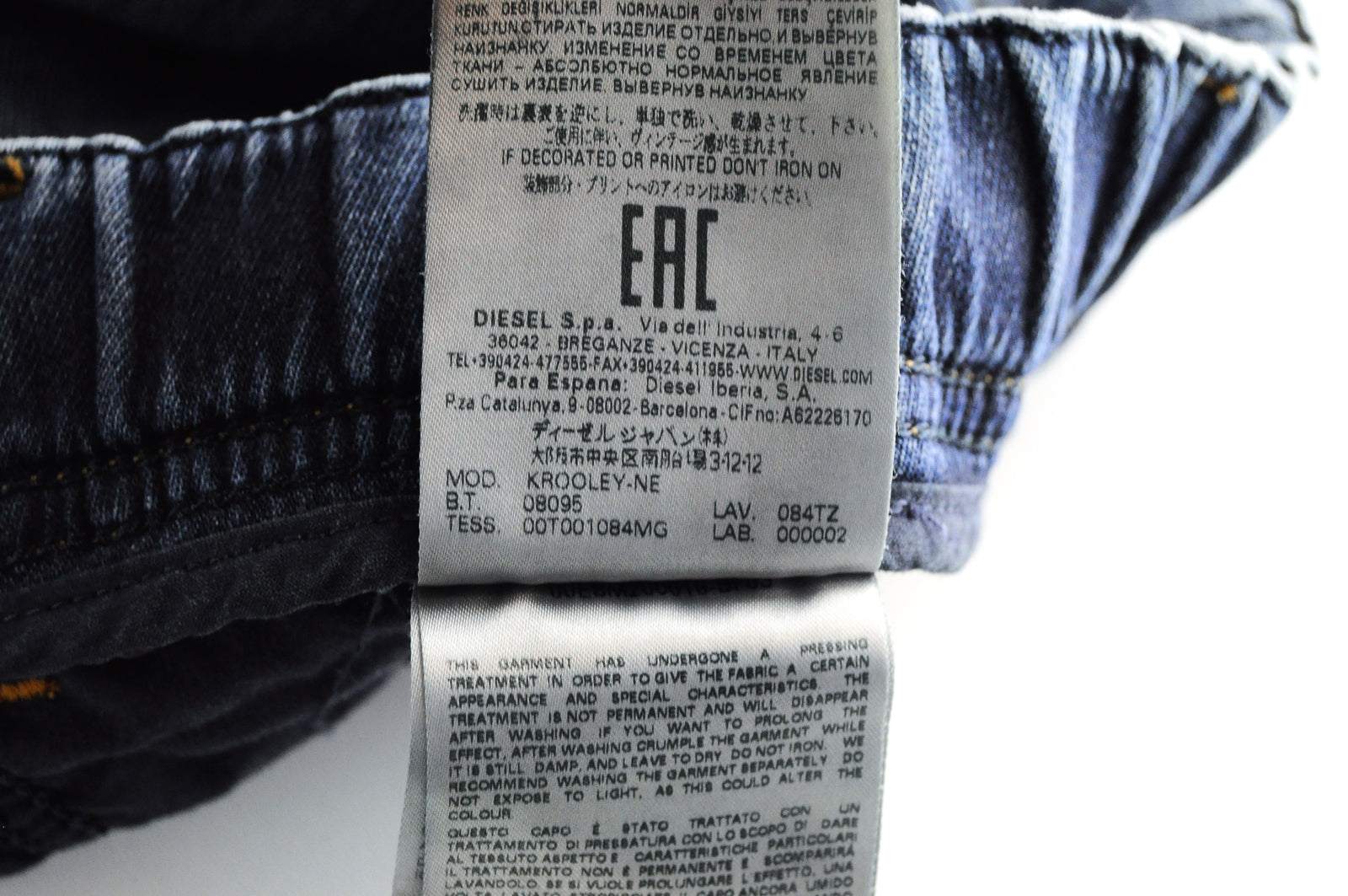 DIESEL Krooley-NE 084TZ W38 vyriški mėlyni siaurėjantys plėšyti tamprūs džinsai 