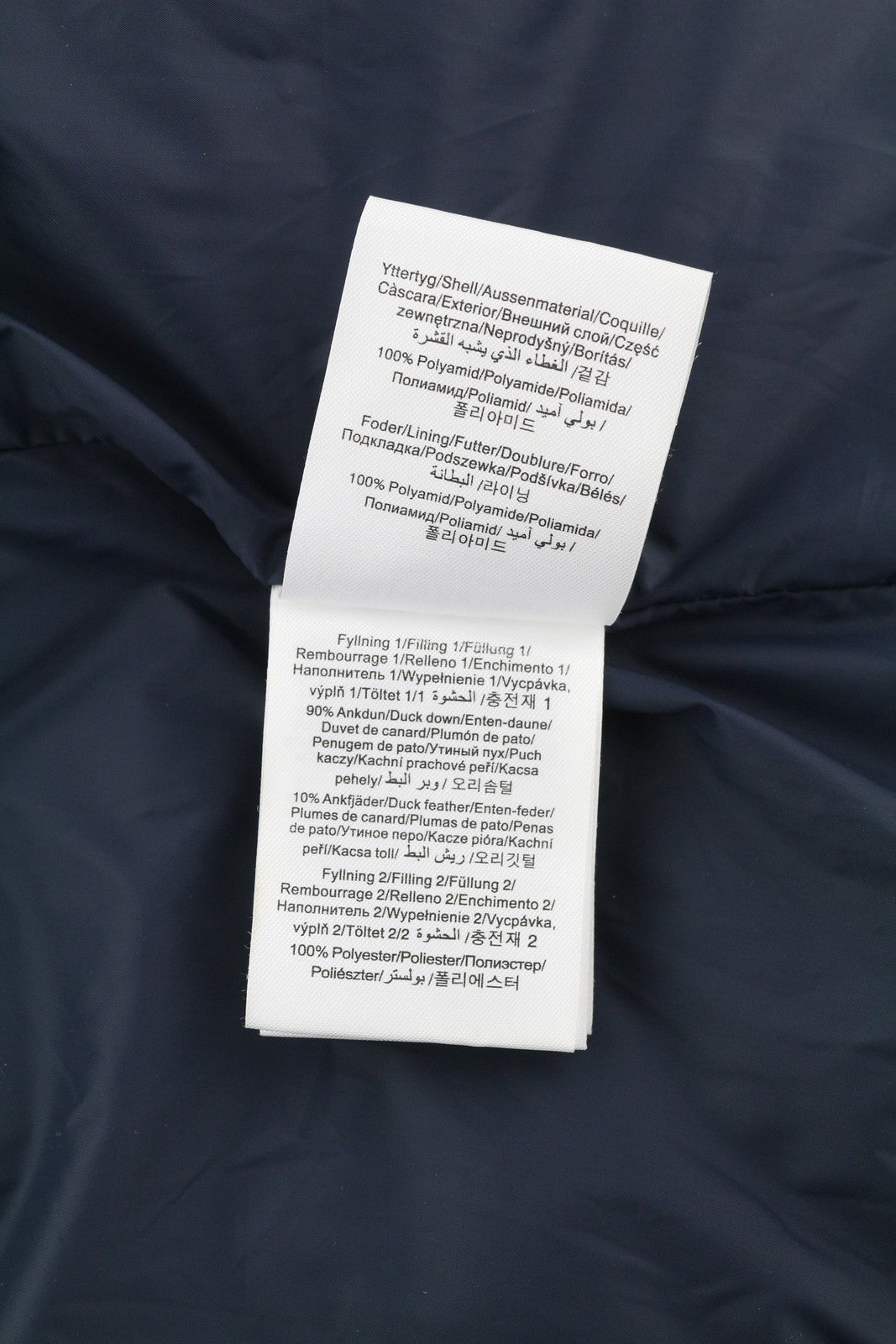 PEAK PERFORMANCE Grace moteriška striukė su tamsiai mėlyna, pūkuota, dygsniuota, pūsta logotipu, S dydžio 