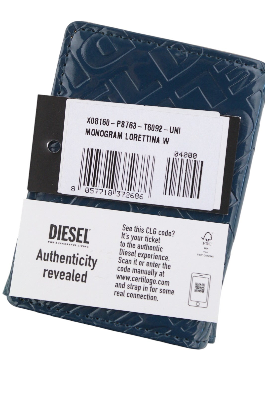 DIESEL Monogram Lorettina moteriška piniginė su mėlyna, ruda dirbtinės odos raštu, rekomenduojama kaina – 100 € 