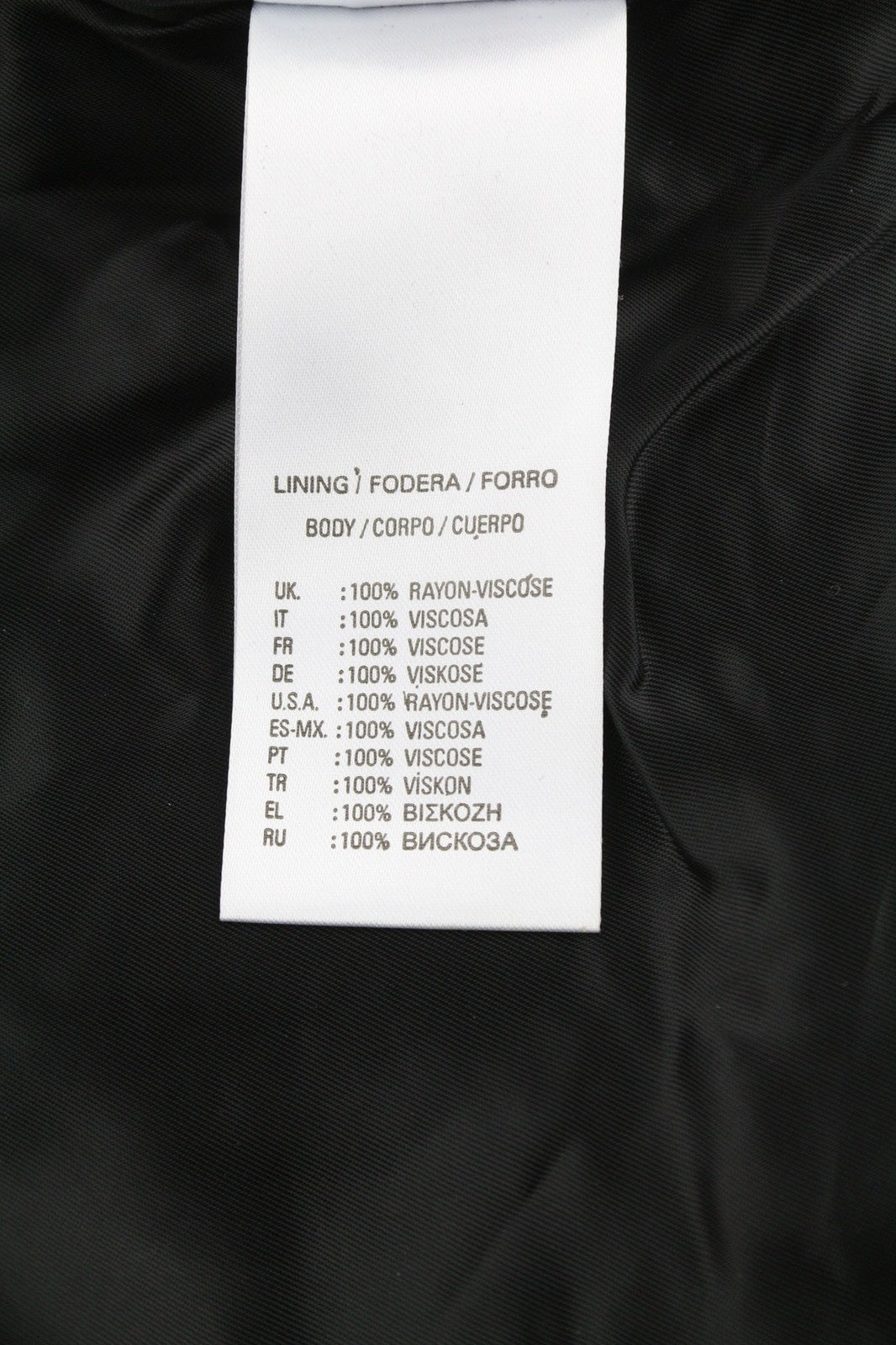 DIESEL R-Sery moteriška striukė XS su avikailio oda, asimetrišku užtrauktuku ir įpjova atlape. 