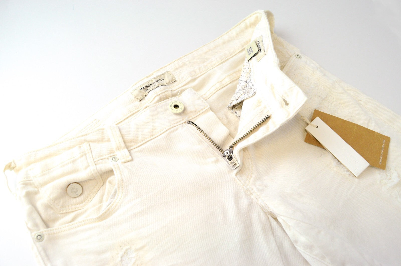 MAISON SCOTCH moteriški džinsai W28/L30 aptempti balti su nutrintais kraštais ir užtrauktuku „Parisienne“ 