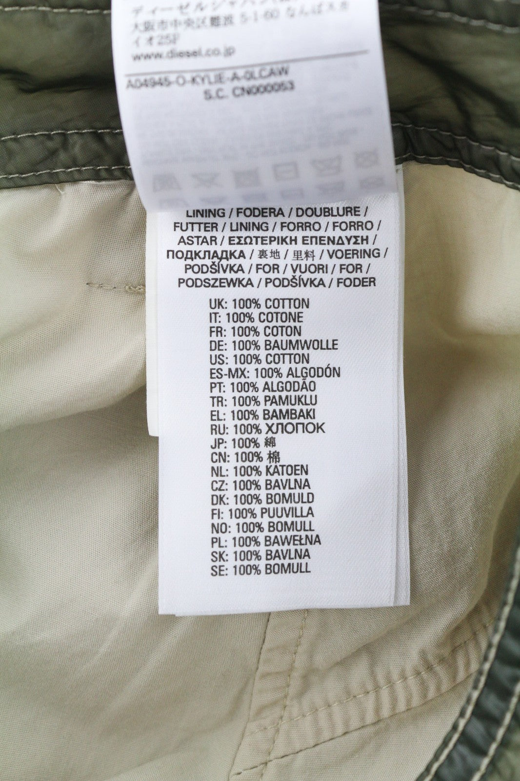 DIESEL O-Kylie-A moteriškas sijonas W26 su karinės žalios spalvos užtiestomis kišenėmis ir užtrauktuku, rekomenduojama kaina – 195 € 