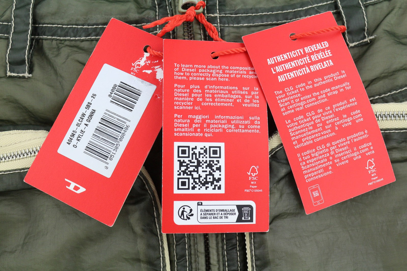 DIESEL O-Kylie-A moteriškas sijonas W26 su karinės žalios spalvos užtiestomis kišenėmis ir užtrauktuku, rekomenduojama kaina – 195 € 